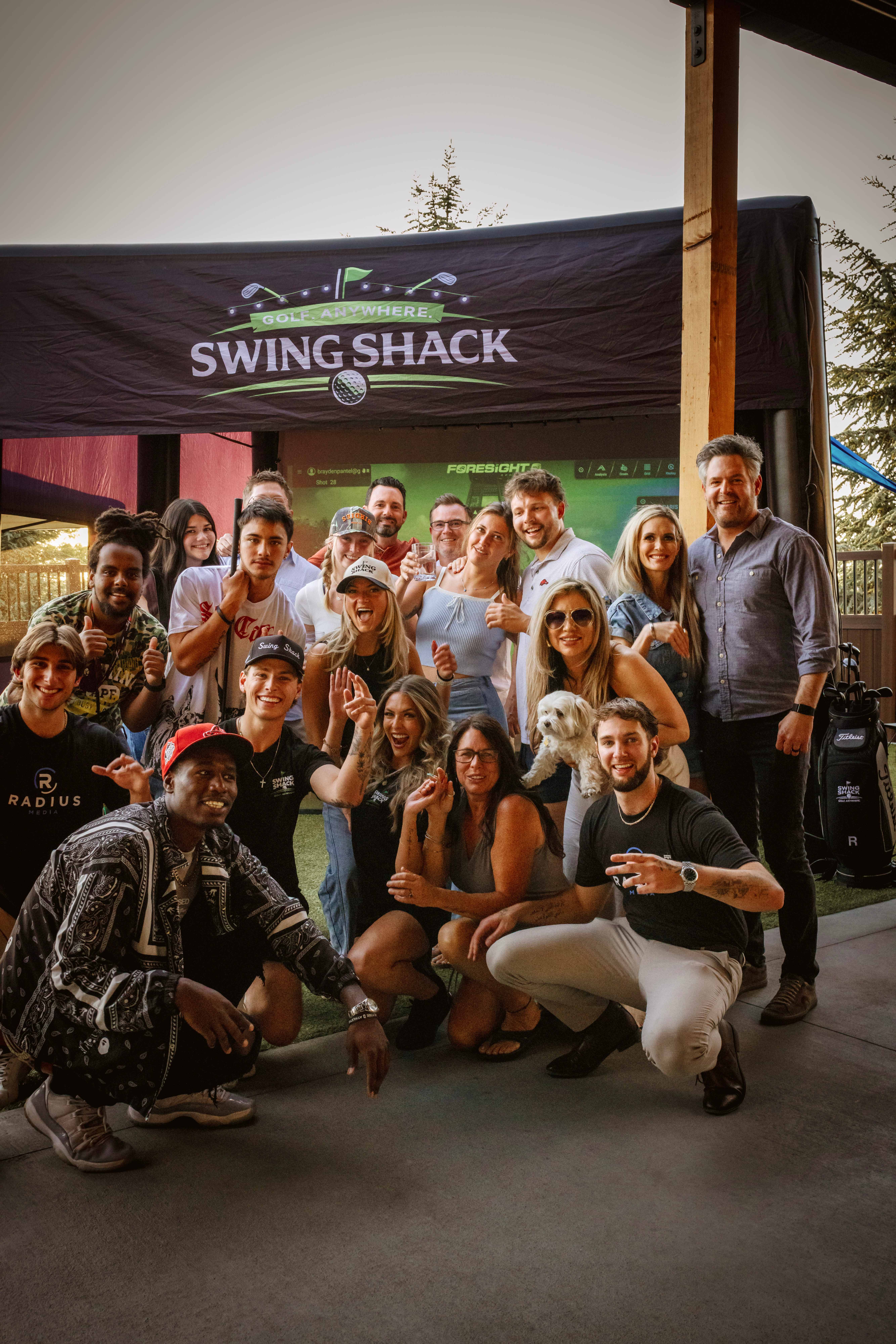 Large group of friends celebrating at a Swing Shack event