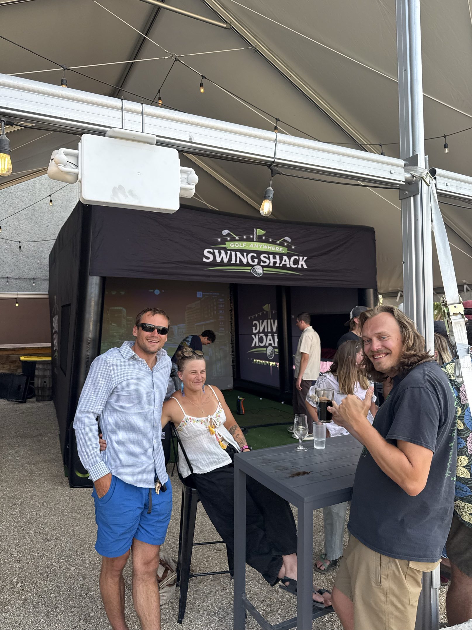 Group of guests laughing together at a Swing Shack event
